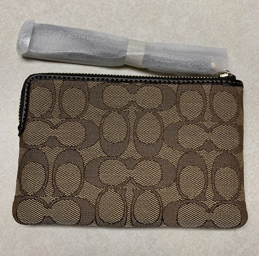 Pulsera COACH Corner con cremallera