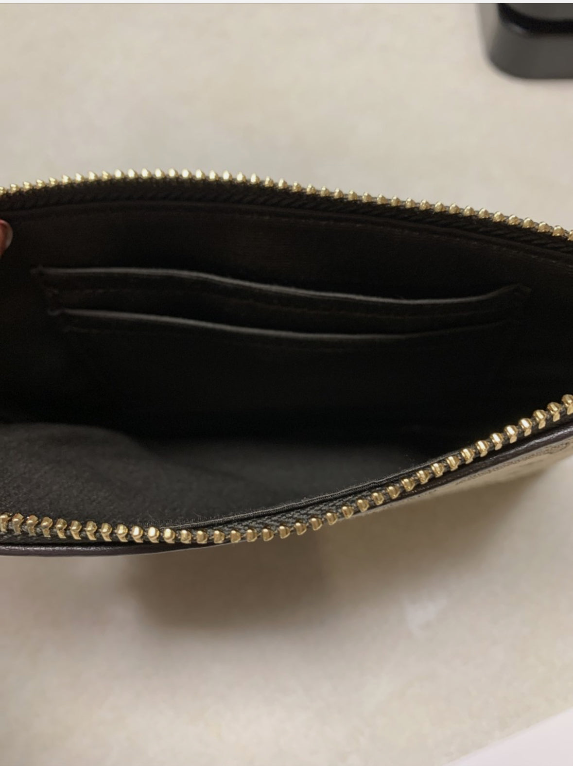 Pulsera COACH Corner con cremallera