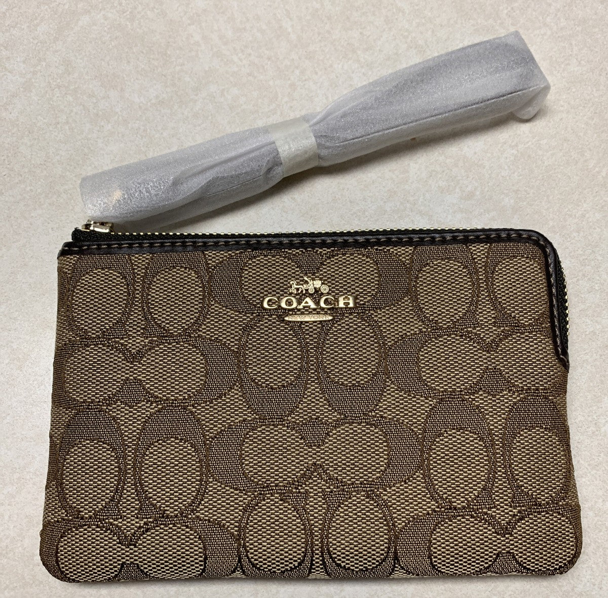 Pulsera COACH Corner con cremallera