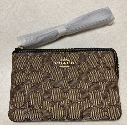 Pulsera COACH Corner con cremallera